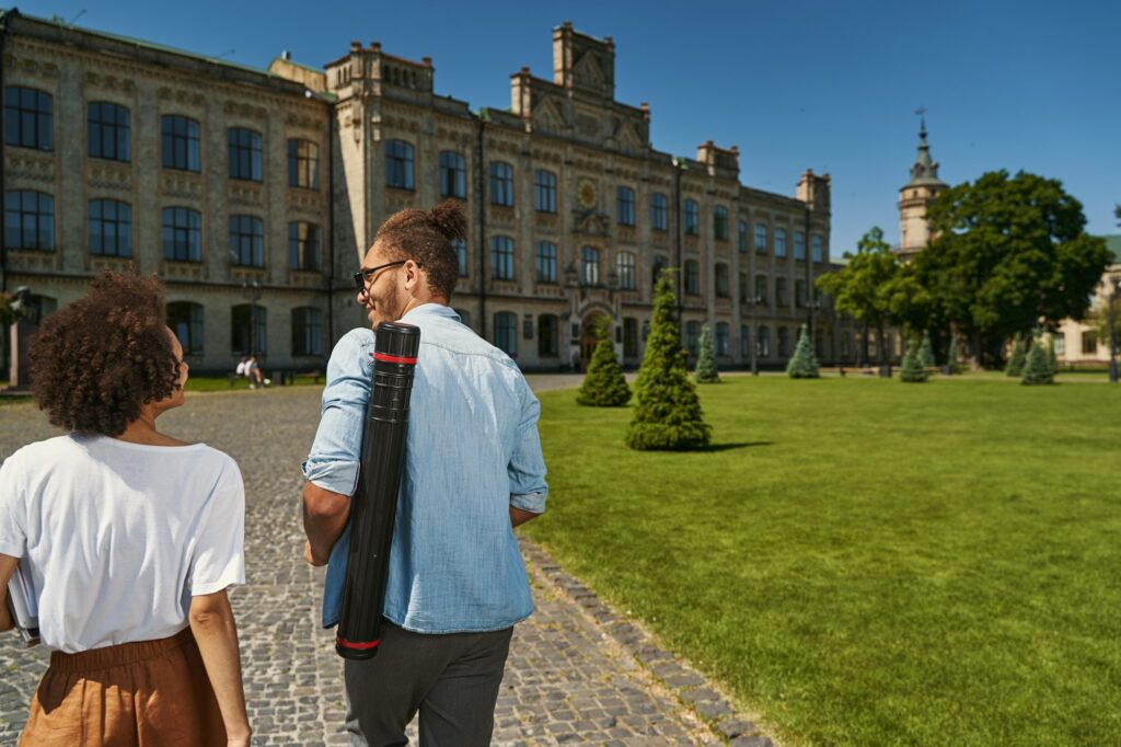 Beautiful university campus and two students in it