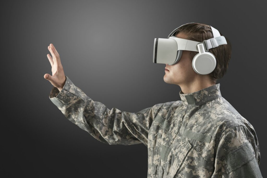 Military man with VR headset in training military technology