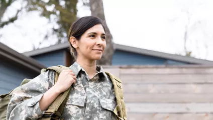 Active-duty military service member completing online college coursework from base or remote location