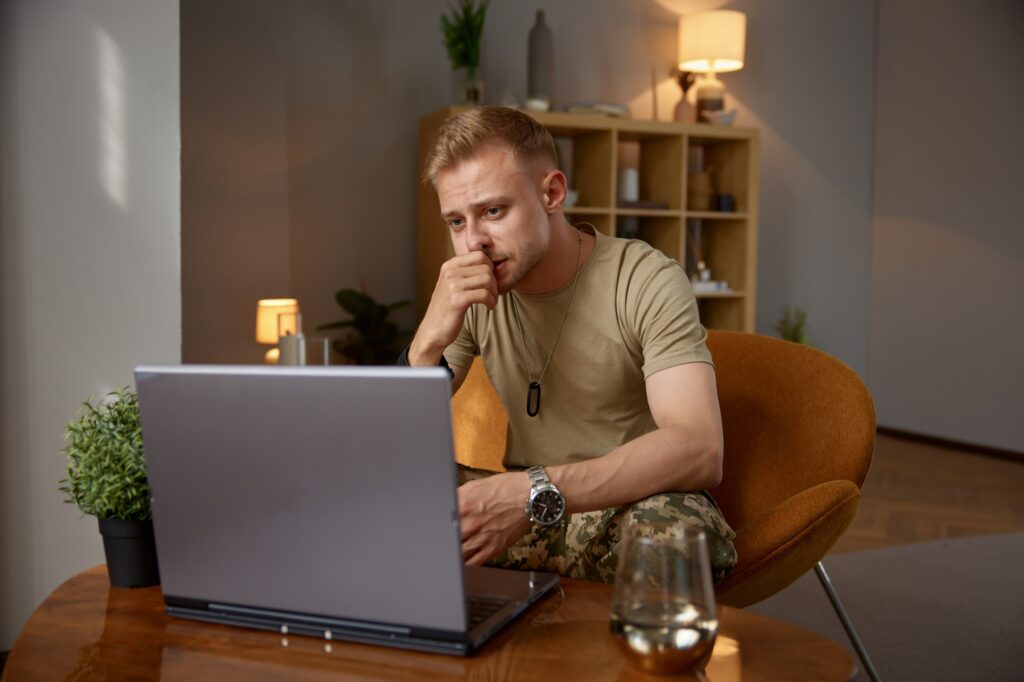 Online consultation of military man with psychiatrist.